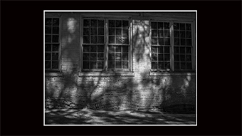 The Richard Philip Soltice Gallery - Sunlight and Shadows on Brick Building