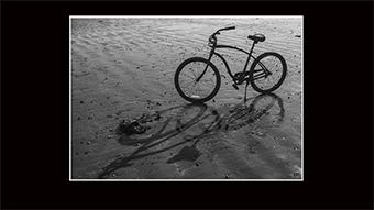 The Richard Philip Soltice Gallery - Bike on Beach in Backlight